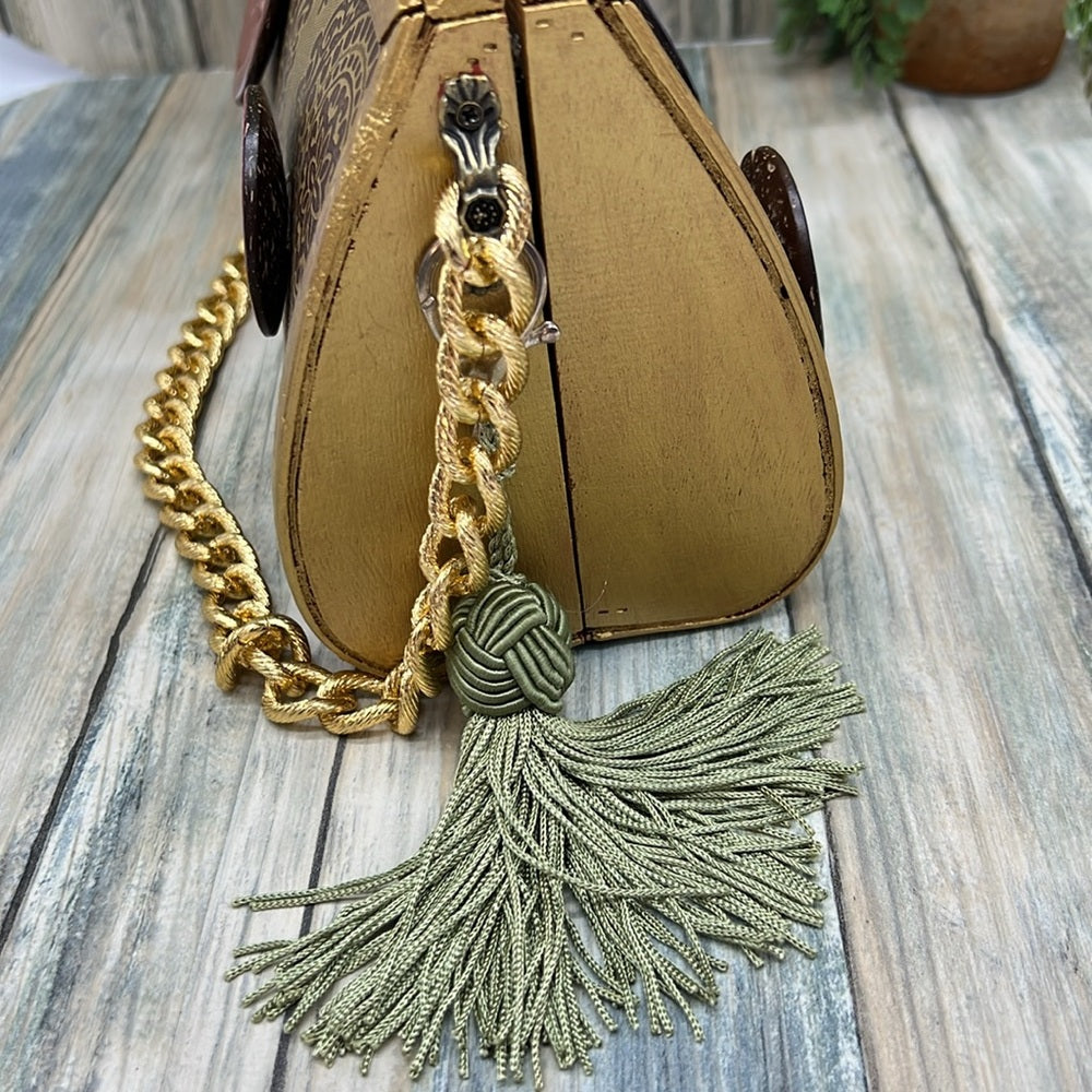 Adorned Crown Altered wood hinged big button gold handle green tassel purse