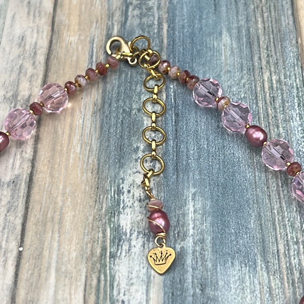 Adorned Crown Artisan Assemblage pink crystal golden rose cross necklace