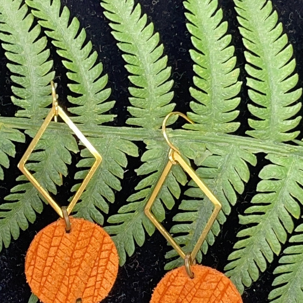 Adorned Crown geometric leather earrings