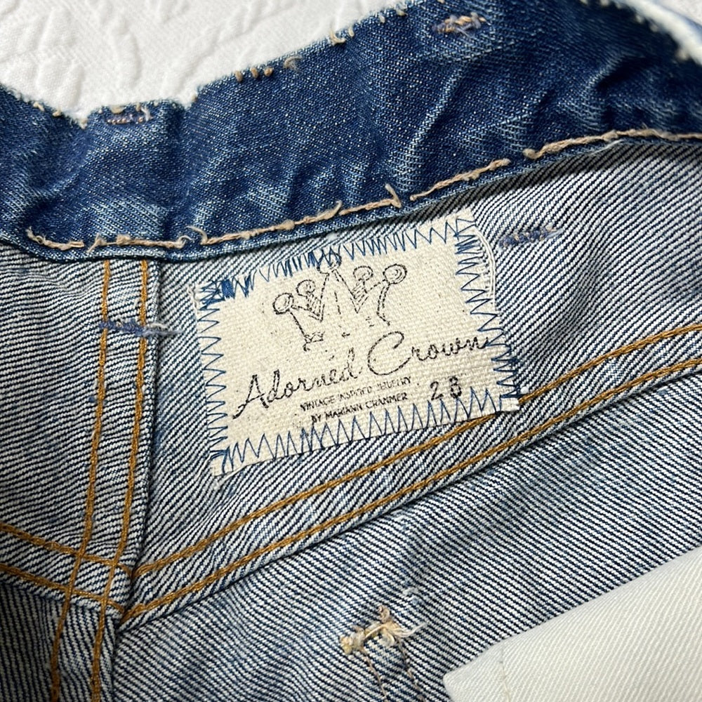 Adorned Crown Textile reworked patch Big E Levi’s cut off shorts upcycle
