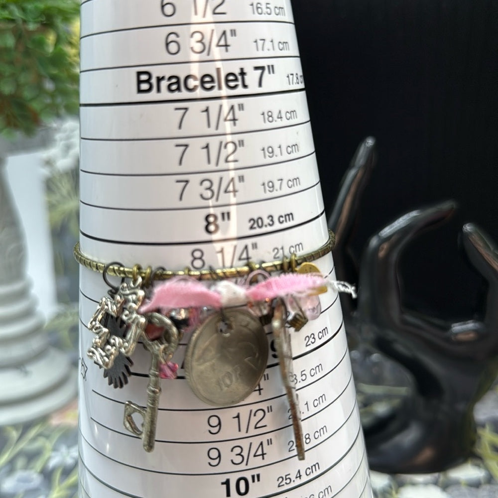 Adorned Crown Jewelry mixed charm key coin pink dangles bangle bracelet