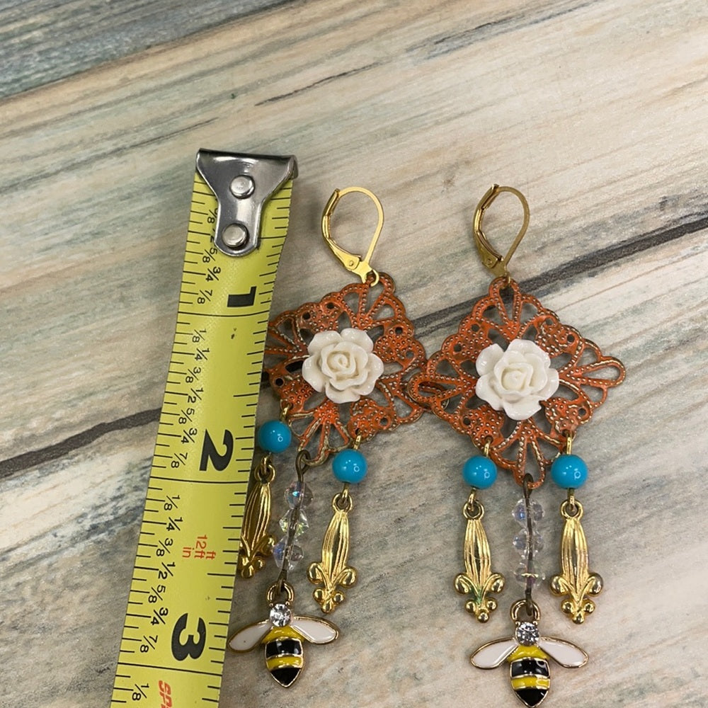 Adorned Crown assemblage buzzing bee earrings