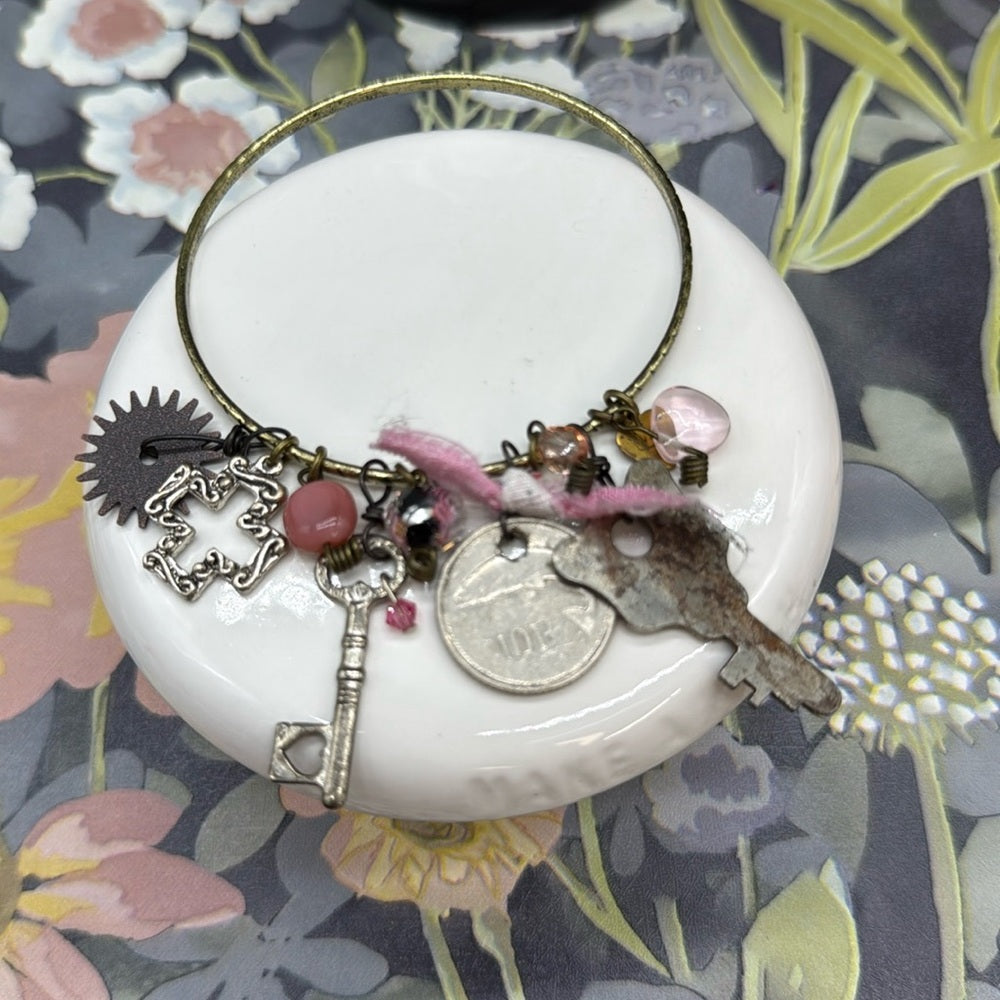 Adorned Crown Jewelry mixed charm key coin pink dangles bangle bracelet
