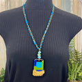 Adorned Crown Artisan Assemblage dichroic glass pendant feather necklace