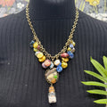 Adorned Crown Jewelry assemblage Pearl seascape bottle of sand shells necklace