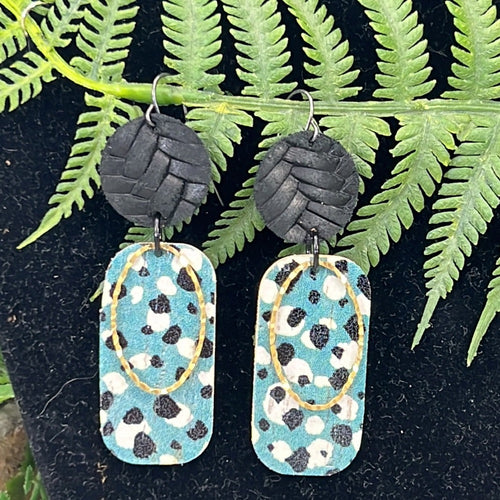 Adorned Crown Artisan Assemblage dotted leather faux leather oval earrings