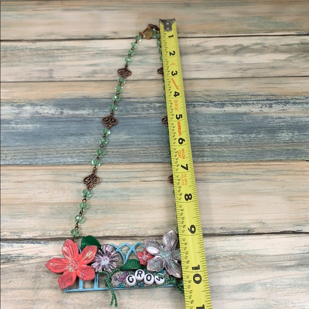 Adorned Crown artisan assemblage GROW Fence garden necklace