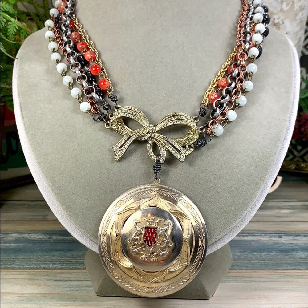 Adorned Crown Artisan assemblage shield medallion multi strand necklace
