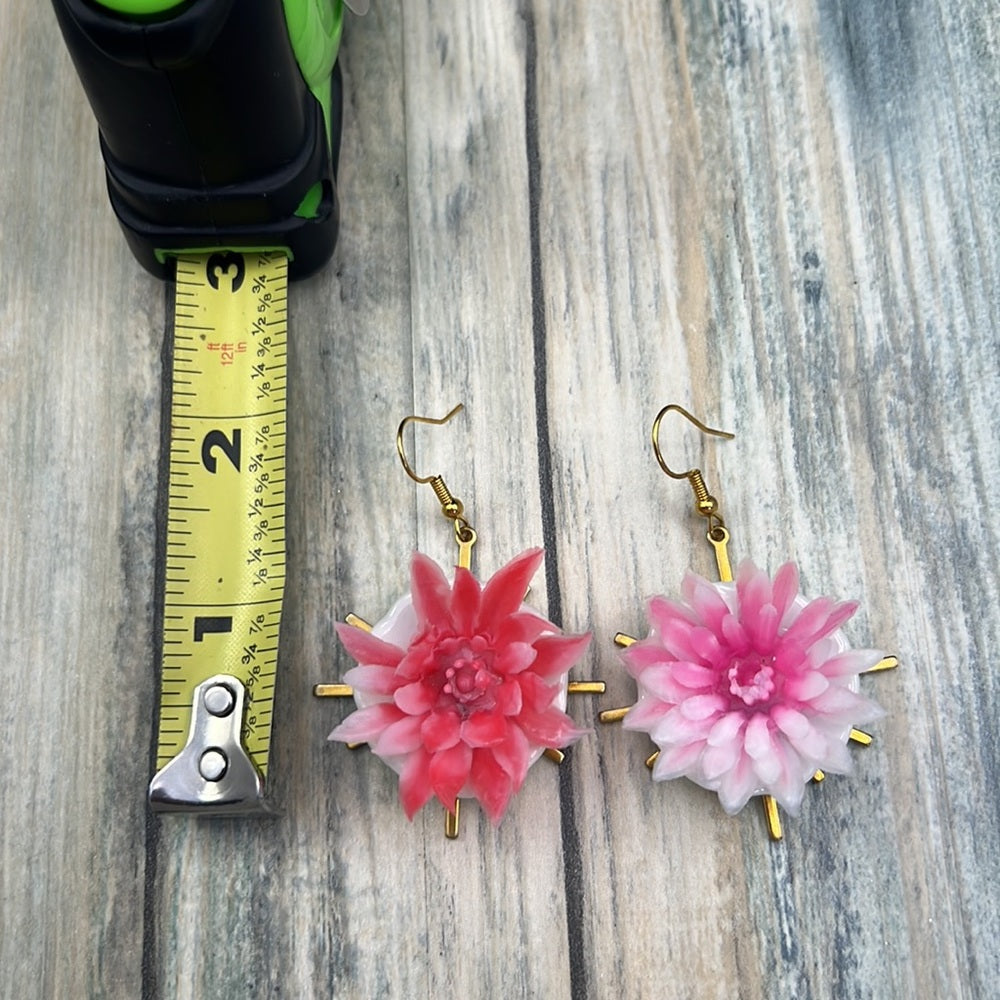 Adorned Crown Assemblage child’s play flower saucer starburst earrings
