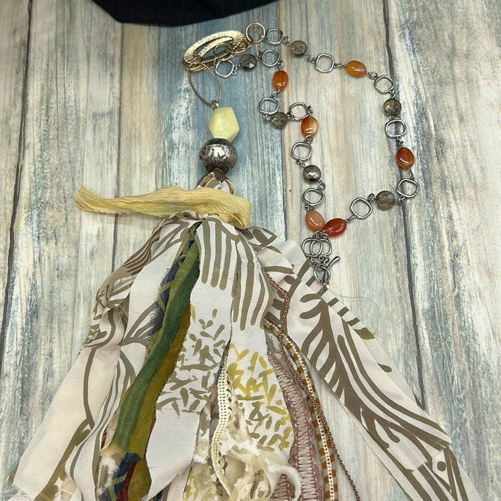 Adorned Crown Jewelry assemblage green yellow tassel stone bead necklace