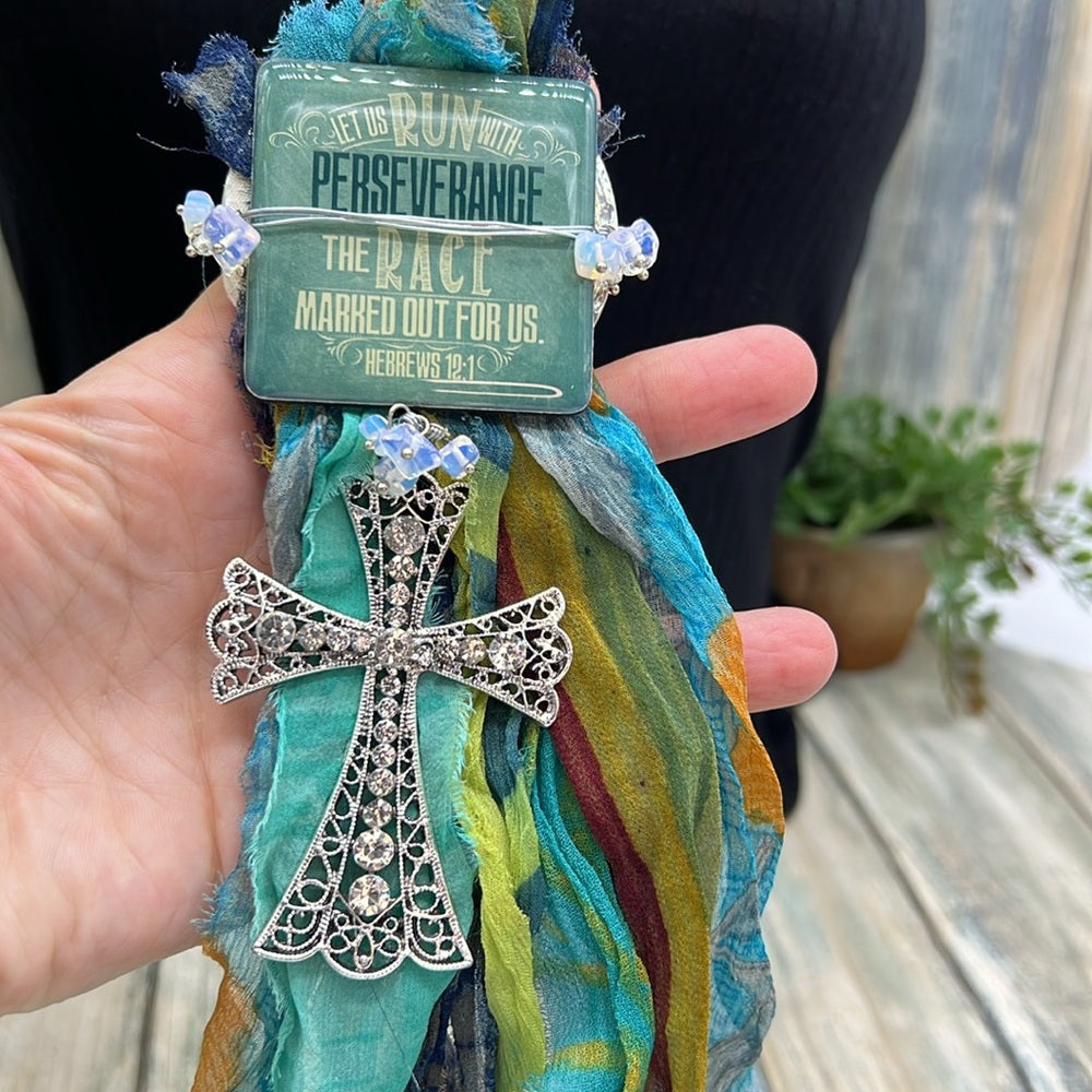 Adorned Crown Jewelry assemblage perseverance run race tassel cross necklace