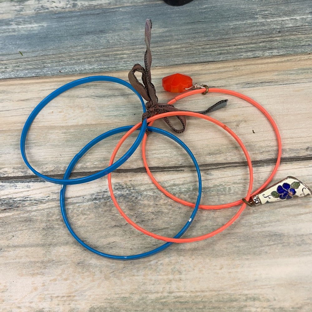 Adorned Crown assemblage blue orange bangles with charms