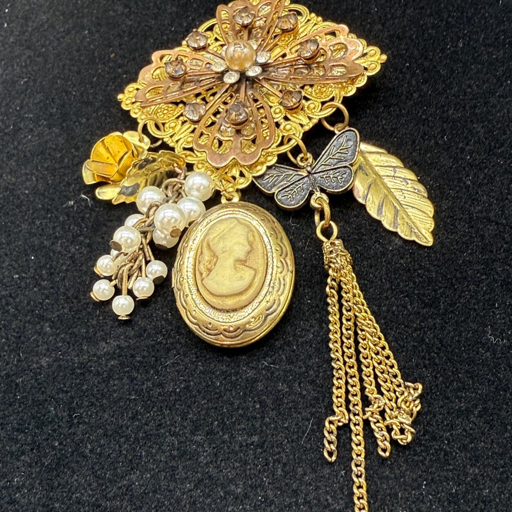 Adorned Crown Jewelry assemblage filigree and charm crystal long necklace