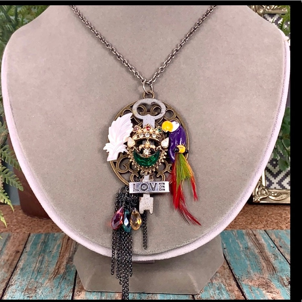 Adorned Crown artisan assemblage jungle toucan bird key cluster necklace
