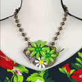 Adorned Crown artisan assemblage enamel flower bird cluster necklace