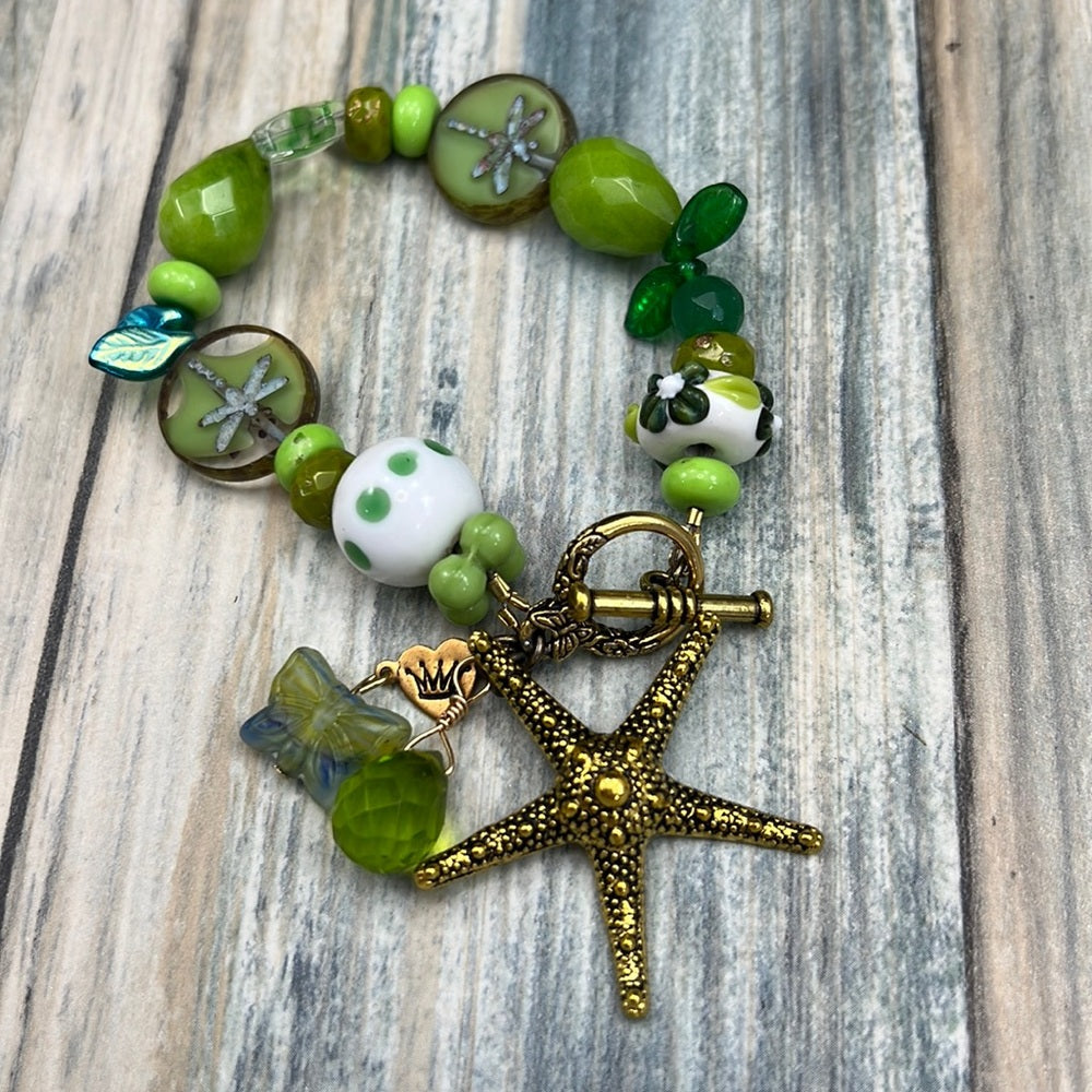Adorned Crown Assemblage beaches & butterflies green starfish bracelet