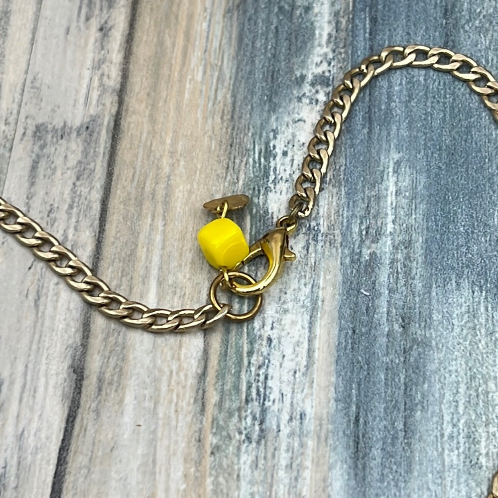 Adorned Crown artisan assemblage child’s play pink car necklace