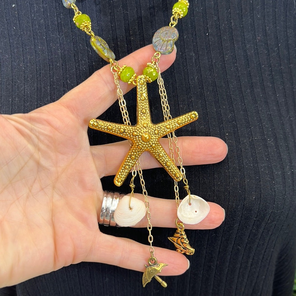 Adorned Crown Assemblage beaches & butterflies starfish fossil bead necklace