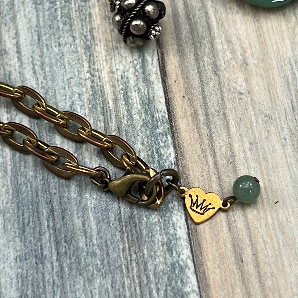 Adorned Crown cowgirl collection pink belt buckle green stone drop necklace