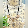 Adorned Crown Jewelry HAPPY jet black crystal bead cross necklace