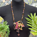 Adorned Crown Jewelry assemblage amethyst skeleton key bits & baubles necklace
