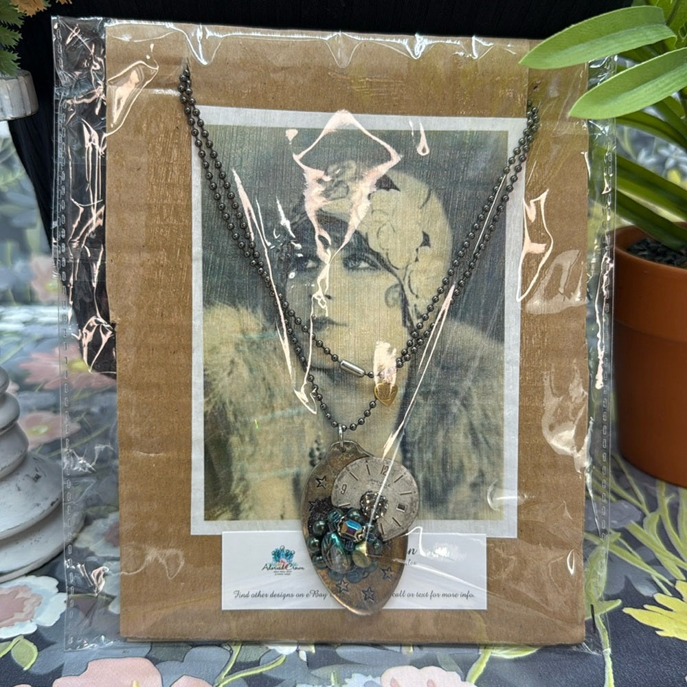 Adorned Crown Jewelry assemblage spoon watch face stars cluster long necklace
