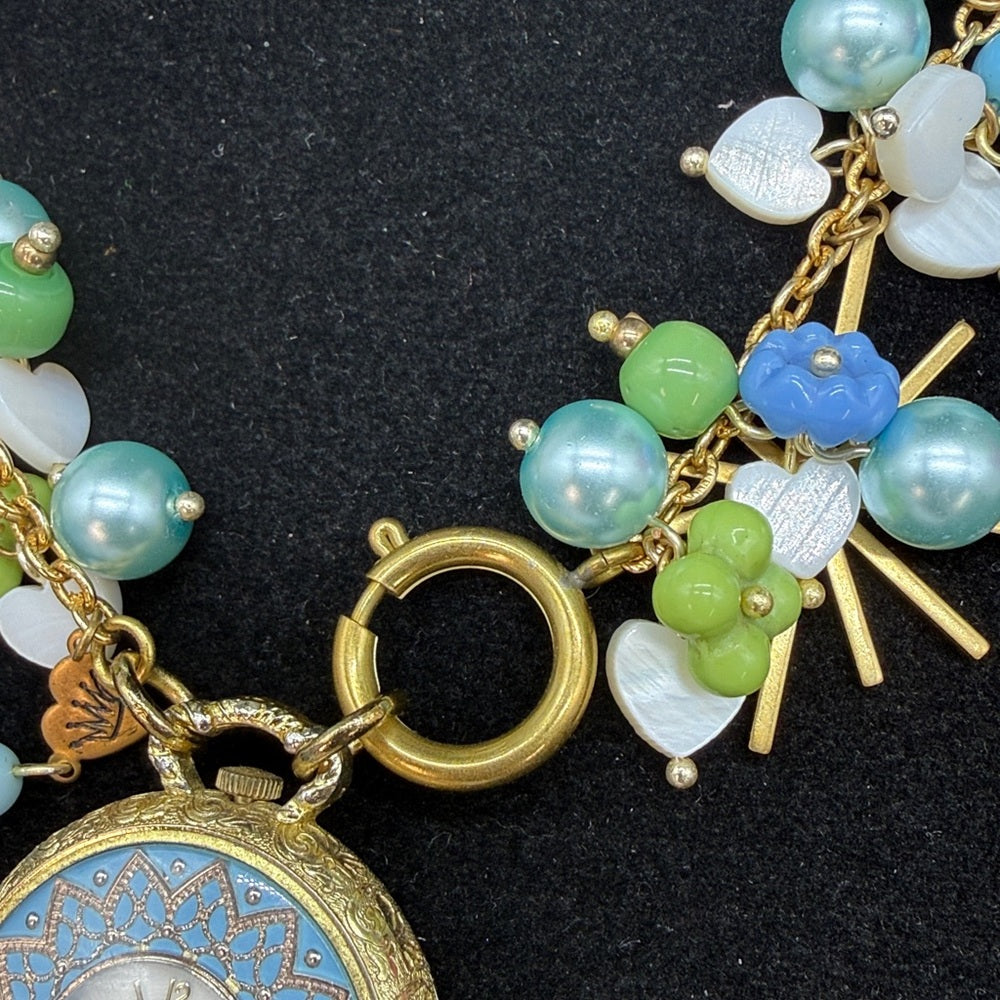Adorned Crown Jewelry assemblage blue green watch starburst Czech necklace