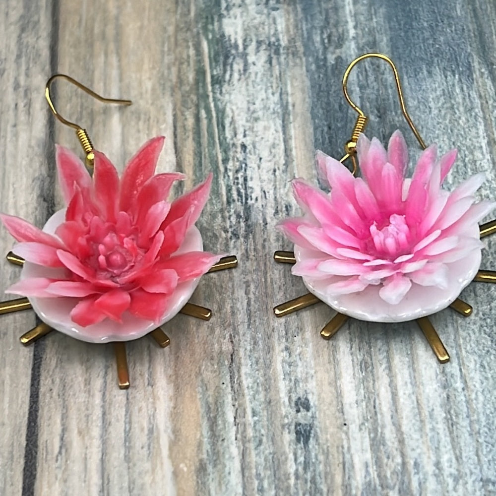 Adorned Crown Assemblage child’s play flower saucer starburst earrings