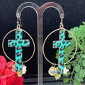 Adorned Crown assemblage teal leopard pattern cross gem drop earrings