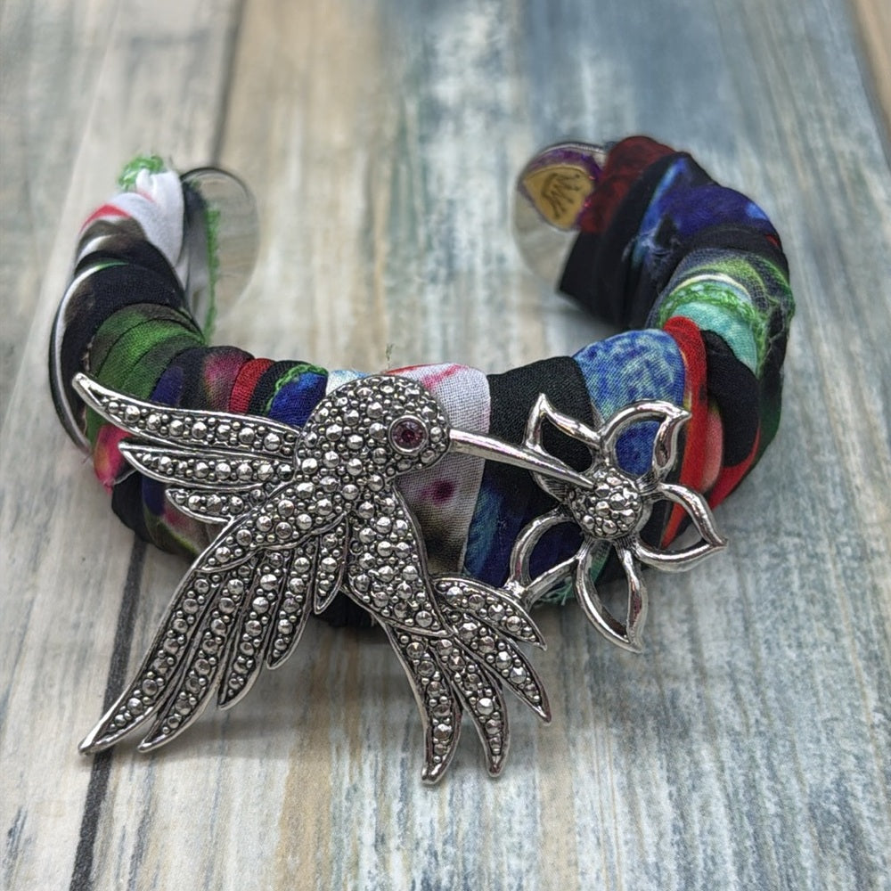 Adorned Crown Jewelry assemblage Hummingbird Multicolor Fabric cuff bracelet