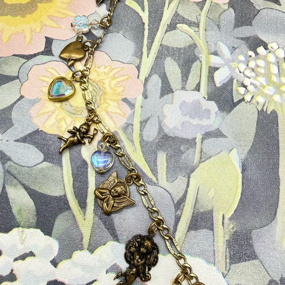 Adorned Crown Jewelry assemblage LOVE cherub charm crystal pendant necklace