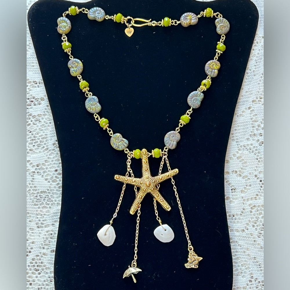 Adorned Crown Assemblage beaches & butterflies starfish fossil bead necklace
