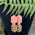 Adorned Crown Artisan Assemblage faux leather starburst long earrings