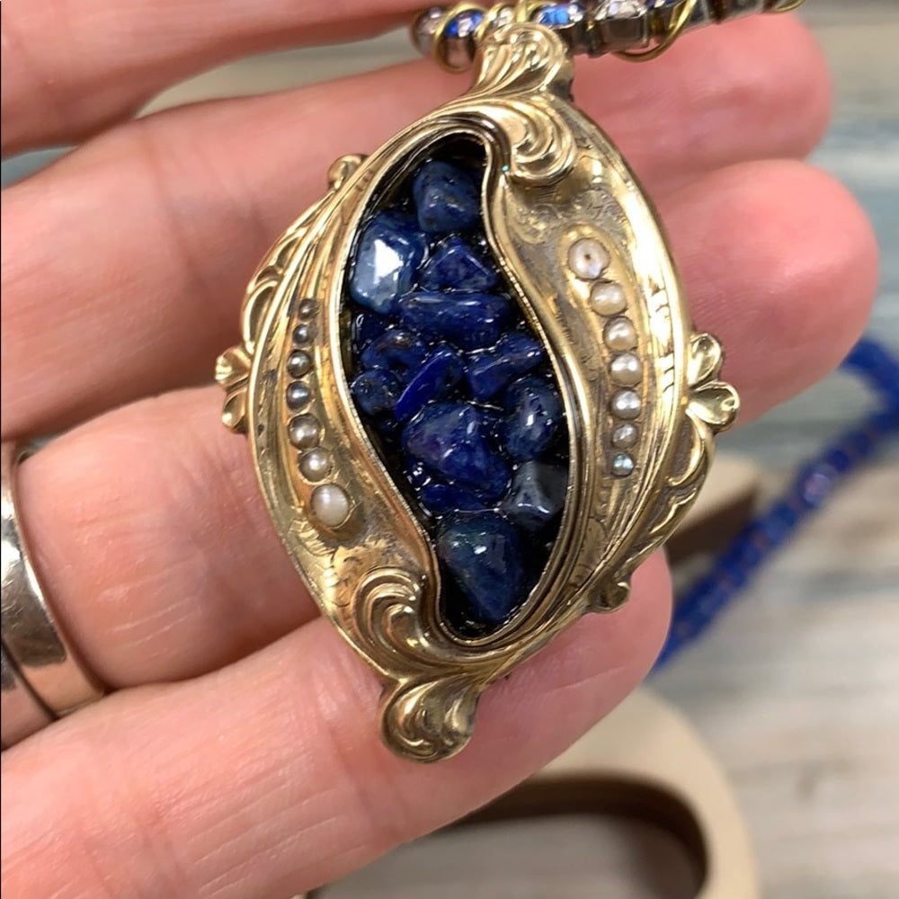 Adorned Crown artisan assemblage gold lapis rhinestone bow necklace