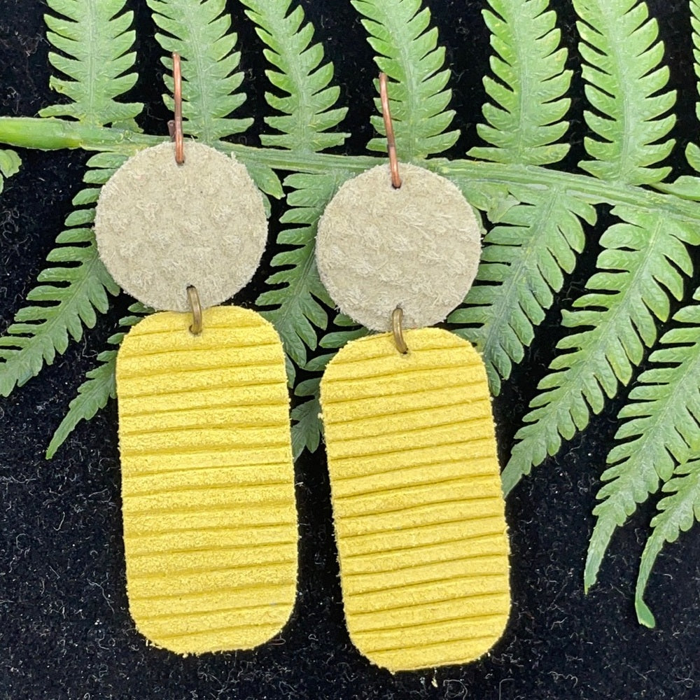 Adorned Crown geo yellow green double leather earrings