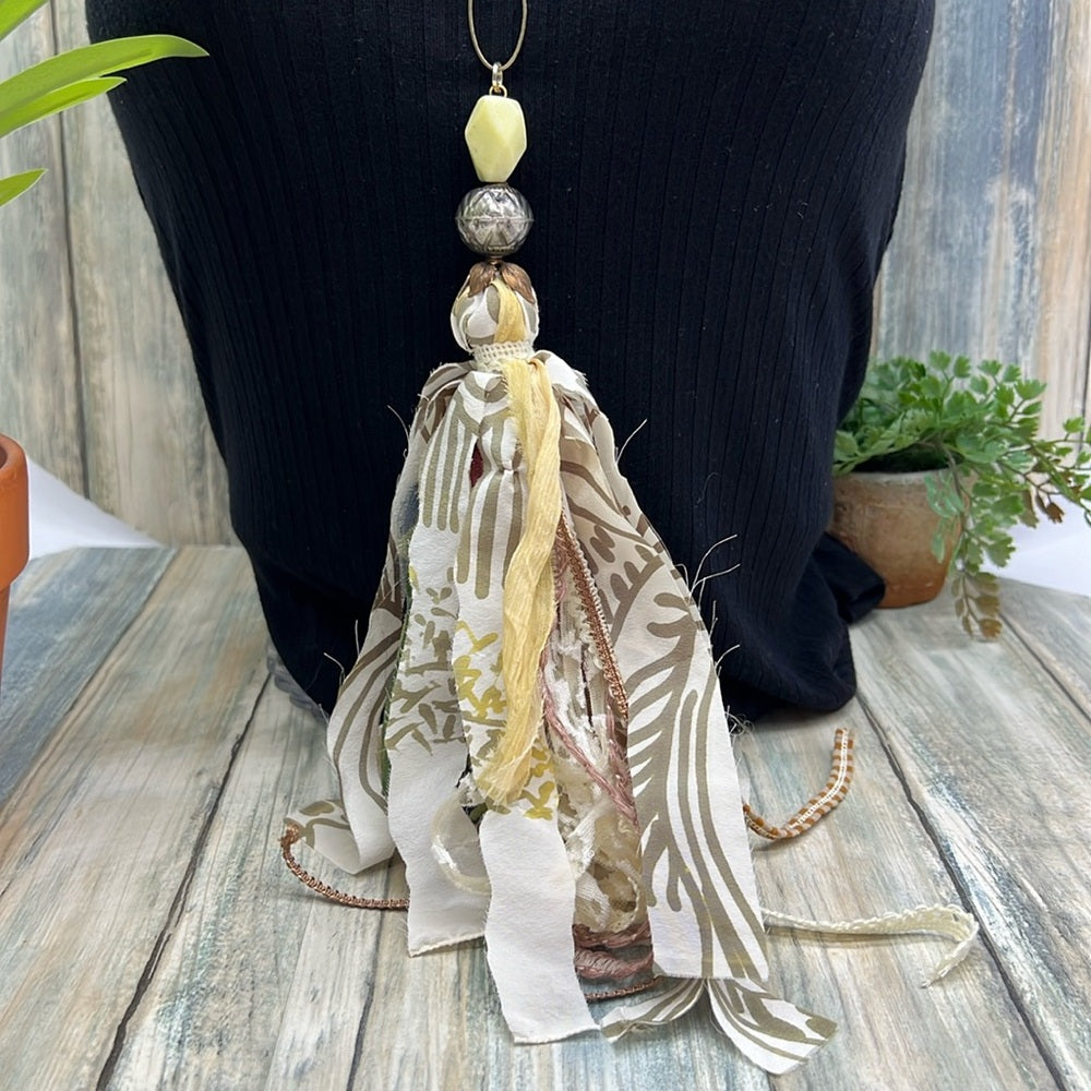 Adorned Crown Jewelry assemblage green yellow tassel stone bead necklace