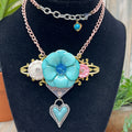 Adorned Crown Jewelry assemblage BLOOM enamel flower heart necklace