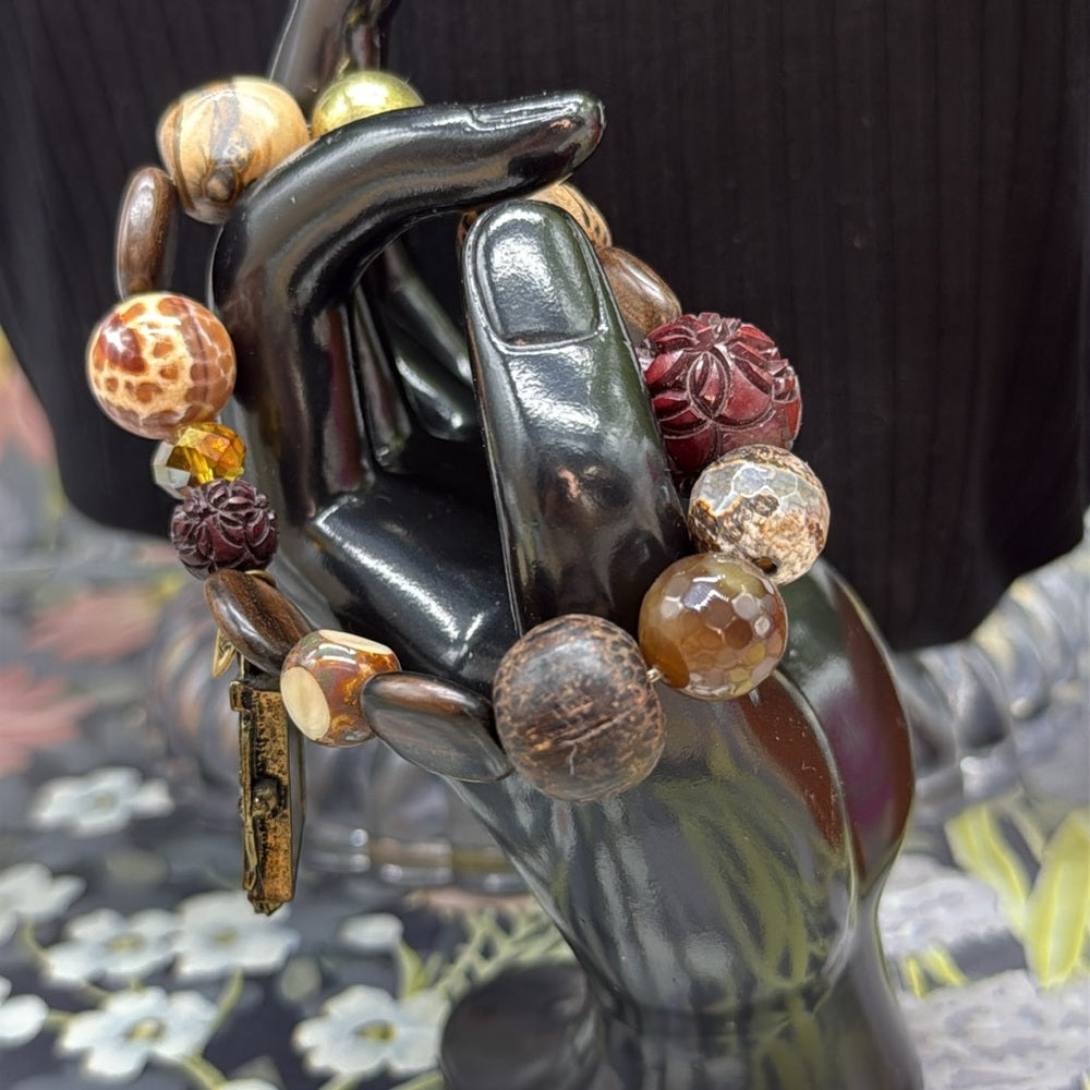 Adorned Crown Jewelry assemblage stretch beaded brown cross bracelet