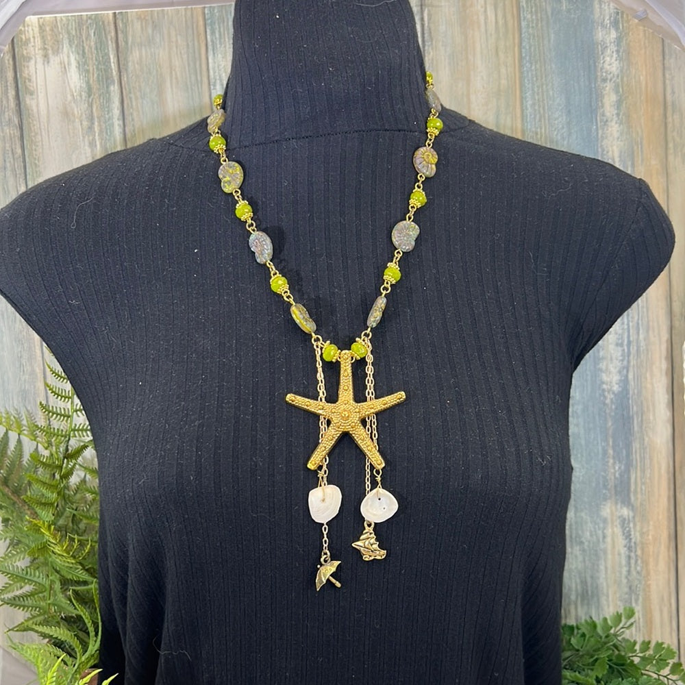 Adorned Crown Assemblage beaches & butterflies starfish fossil bead necklace