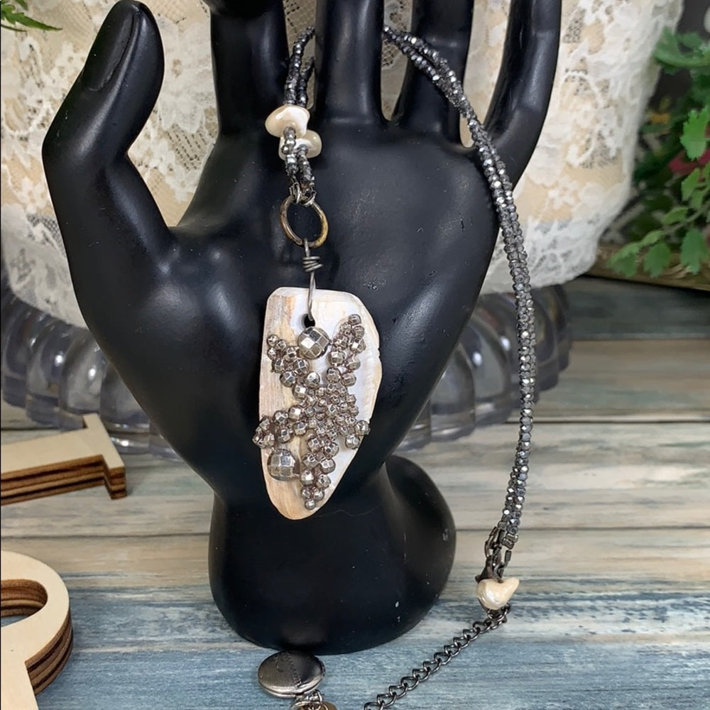 Adorned Crown artisan assemblage shell cut steel beaded minimal necklace