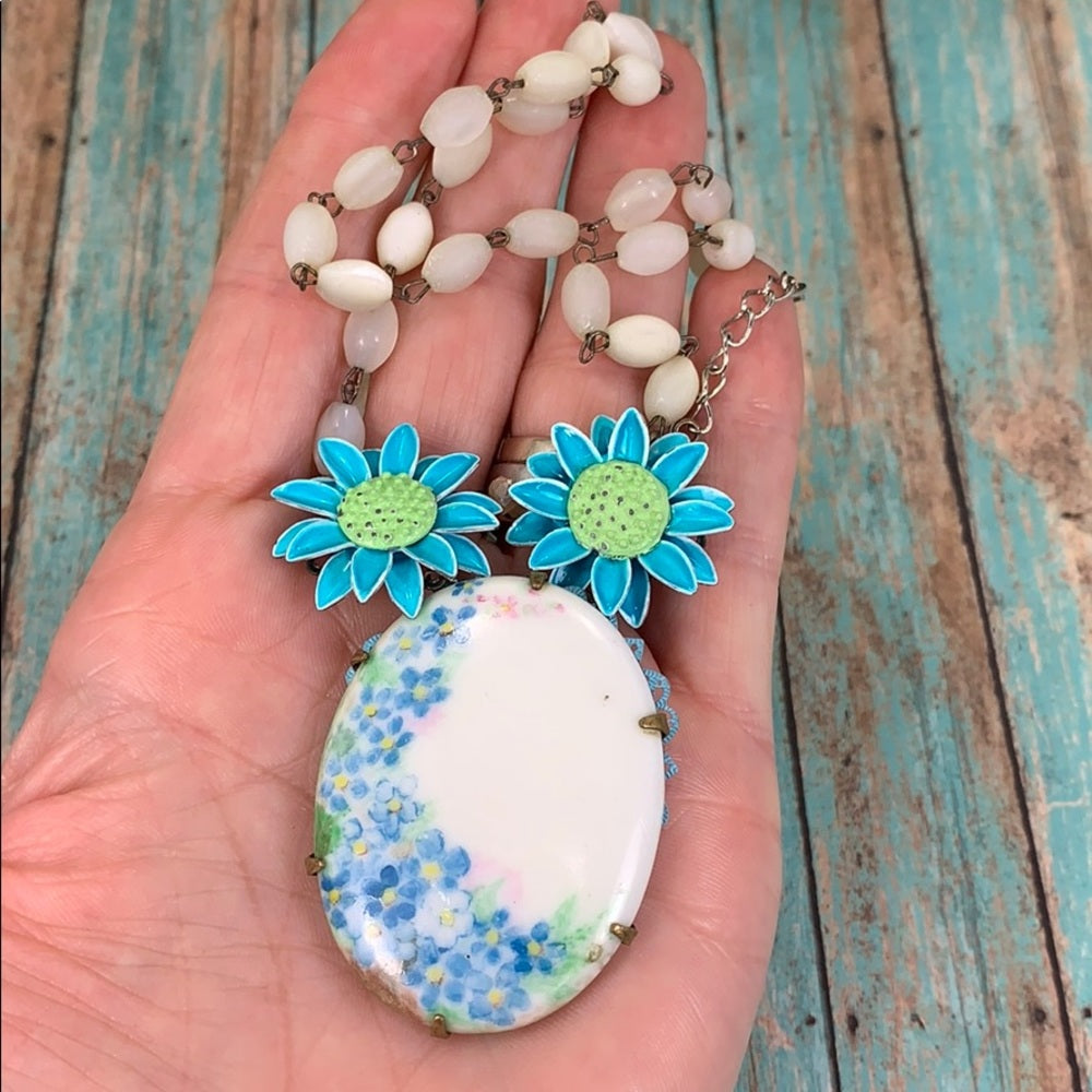 Adorned Crown artisan assemblage blue painted flower rosary bead necklace
