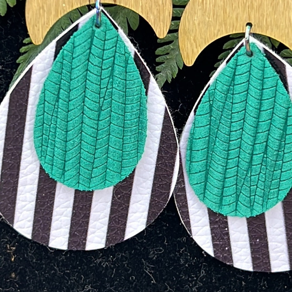 Adorned Crown Artisan Assemblage leather crescent green stripe earrings