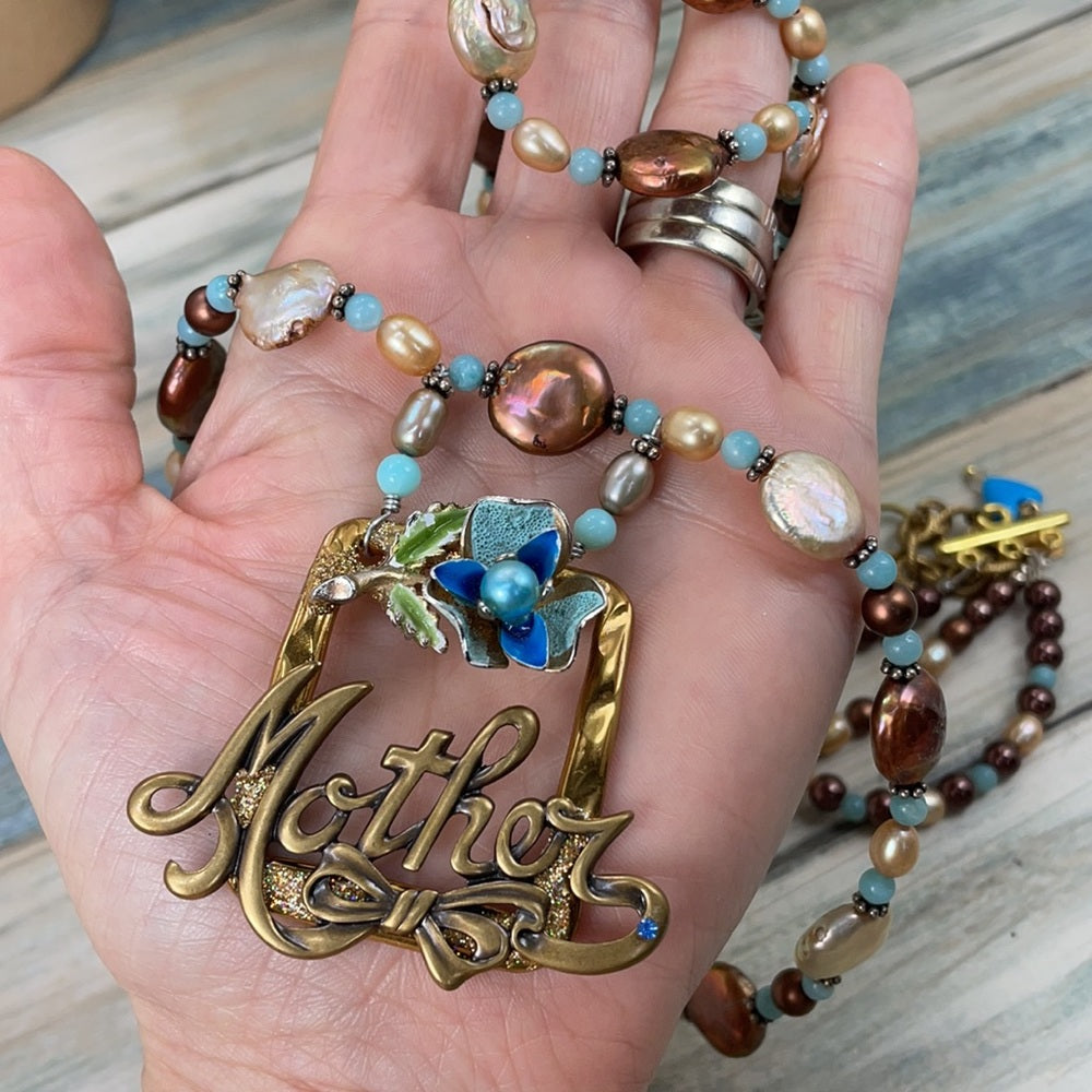 Adorned Crown Artisan Assemblage enamel flower beaded pearl mother necklace