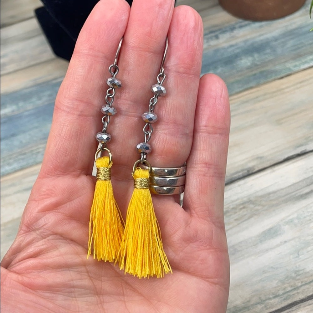 Adorned Crown assemblage yellow tassel crystal drop earrings