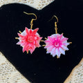 Adorned Crown Assemblage child’s play flower saucer starburst earrings