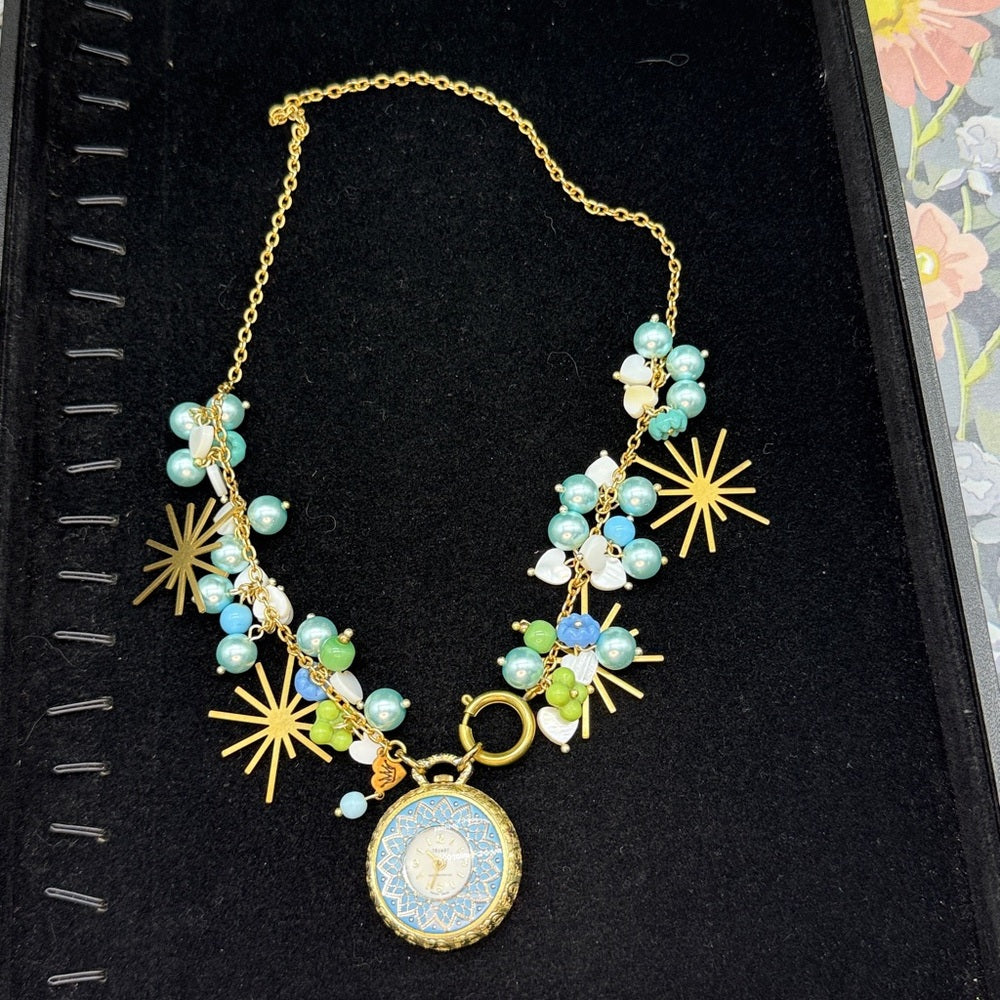 Adorned Crown Jewelry assemblage blue green watch starburst Czech necklace