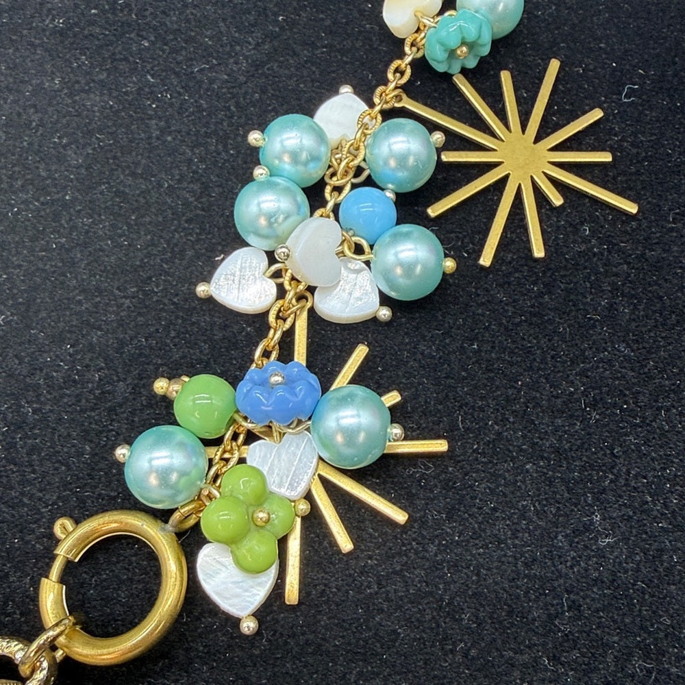 Adorned Crown Jewelry assemblage blue green watch starburst Czech necklace