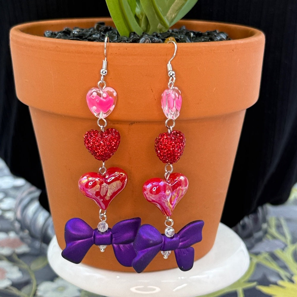 Adorned Crown Jewelry pink heart glitter red bows Valentine's Day earrings