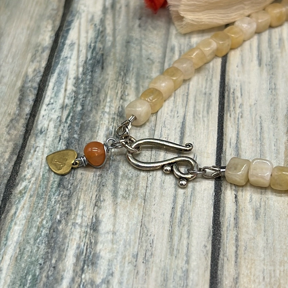 Adorned Crown Jewelry assemblage ceramic shaker tassel stone bead necklace