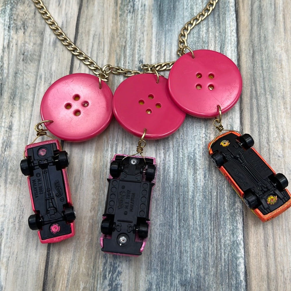 Adorned Crown artisan assemblage child’s play pink car necklace